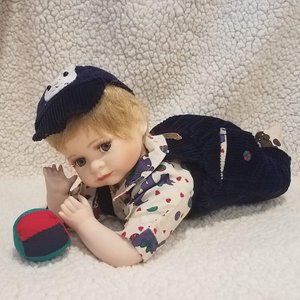 Porcelain collectible 'Sammy' doll